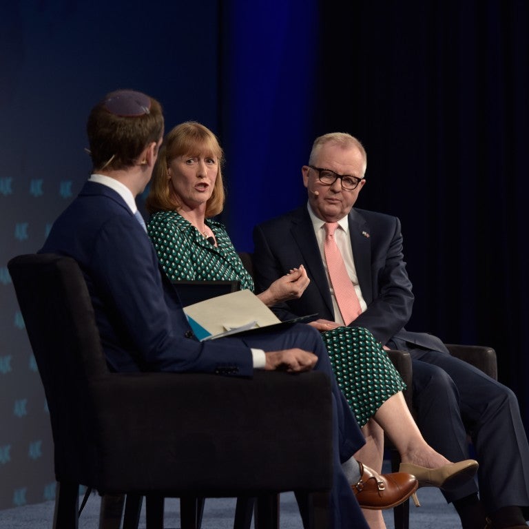 Photo of Seffi Kogen interviewing two members of British Parliament, Joan Ryan and Ian Austin, at AJC Global Forum 2019